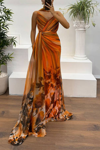 Vestido largo plisado con abertura y estampado floral de gasa de Dreamland 