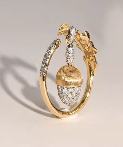 Anillos únicos de borlas de piñones con circonitas doradas y plata esterlina 