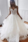 Vestidos de novia glamurosos de corte A con tirantes finos, apliques de encaje y tul 