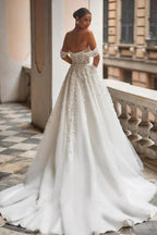 Hermoso vestido de novia de corte A con apliques de tul y encaje con hombros descubiertos