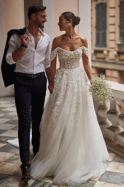 Hermoso vestido de novia de corte A con apliques de tul y encaje con hombros descubiertos
