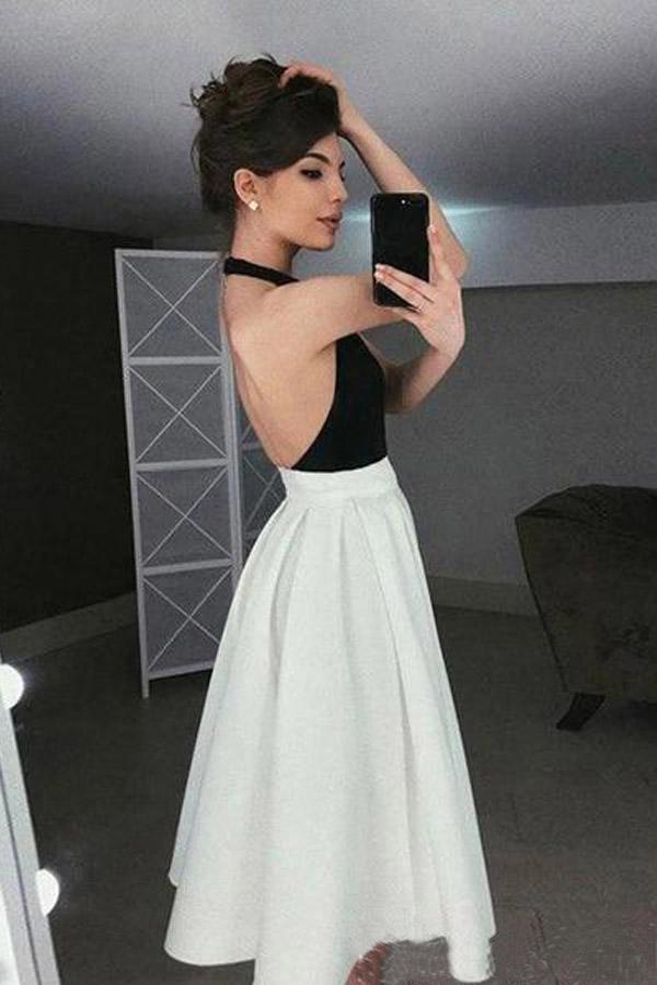 Kurzes Abendkleid mit hochgeschlossenem Neckholder-Oberteil und Faltenrock