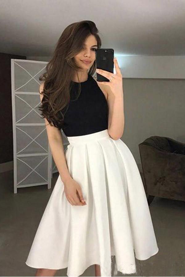 Kurzes Abendkleid mit hochgeschlossenem Neckholder-Oberteil und Faltenrock