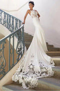 Vestido de novia largo de sirena con tirantes finos y encaje sin espalda