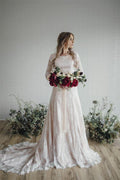 Transparentes Brautkleid mit langen Ärmeln, Spitze und hohem Ausschnitt
