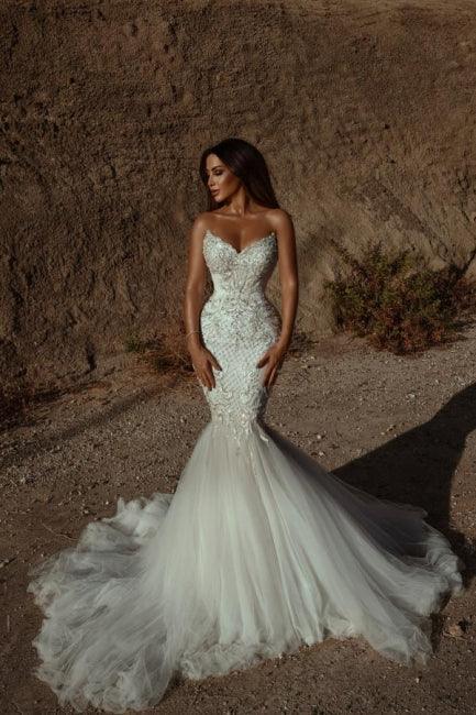 Atemberaubendes, ärmelloses Meerjungfrauen-Brautkleid mit Herzausschnitt und Perlenstickerei aus Tüll 