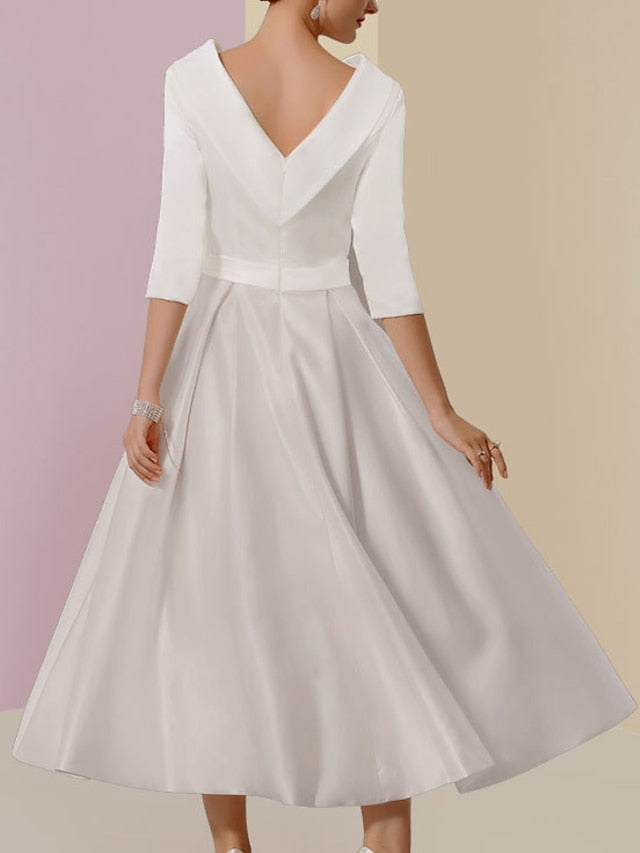 A-Linien-/Prinzessinnen-Kleid mit Rundhalsausschnitt, halben Ärmeln, Teelänge, Taschen und Falten für die Mutter der Braut 
