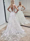 Vestidos de novia de tul y encaje con cuello en V, espalda descubierta y corte en A largo